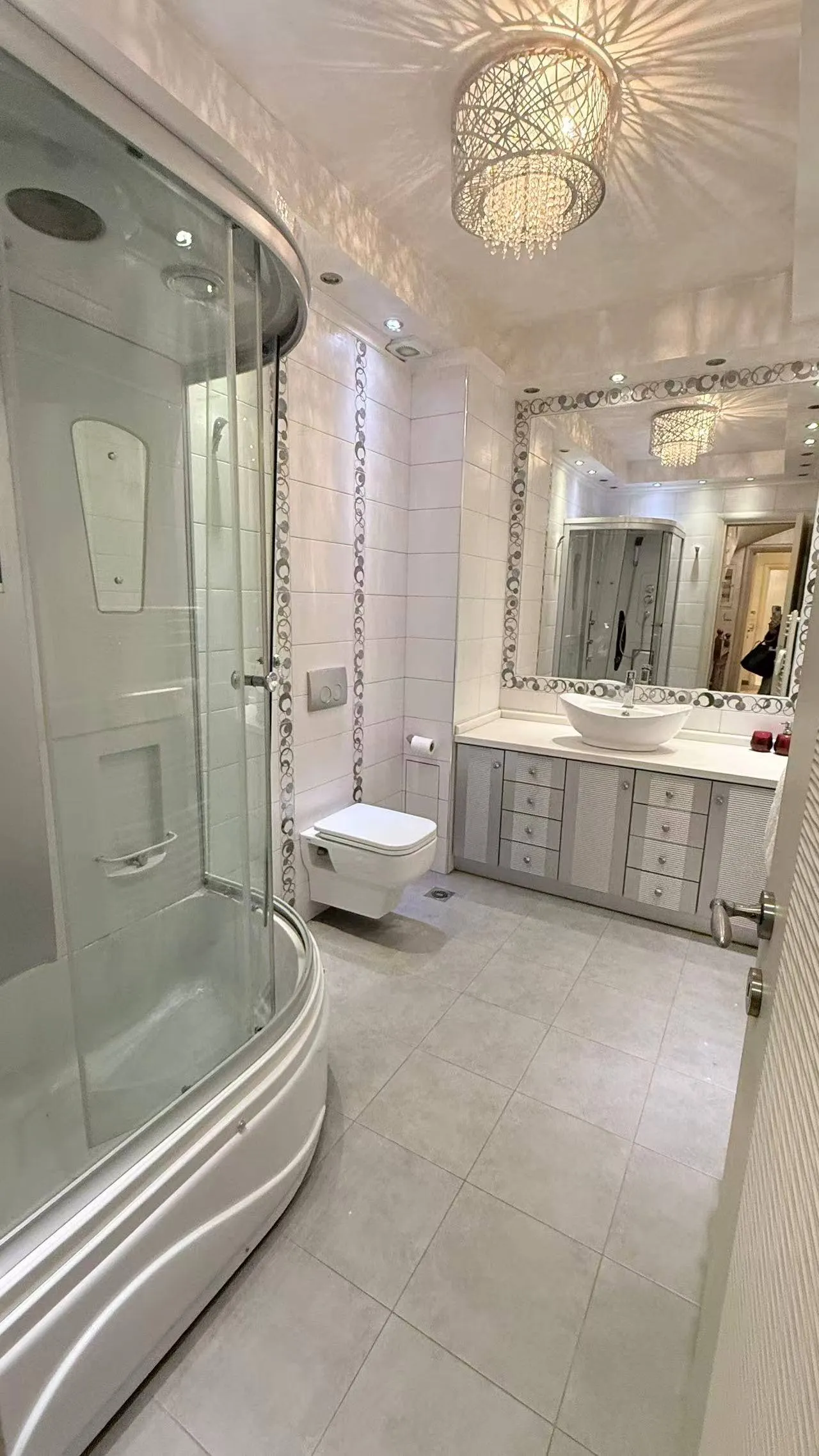 En-suite bathroom with spa shower