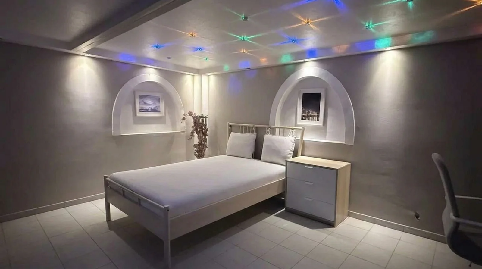 Wide-angle view of the basement bedroom