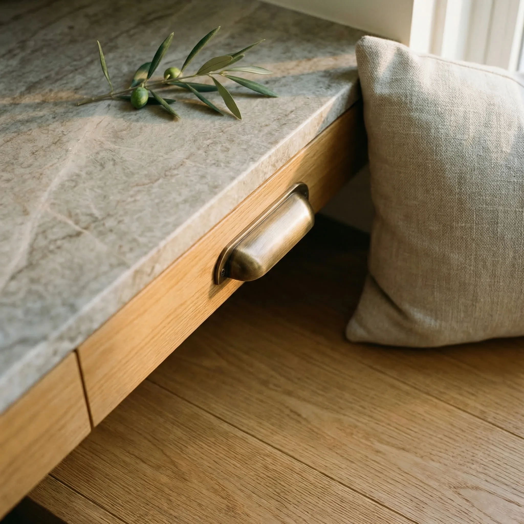 Material palette — stone, brass, linen, oak