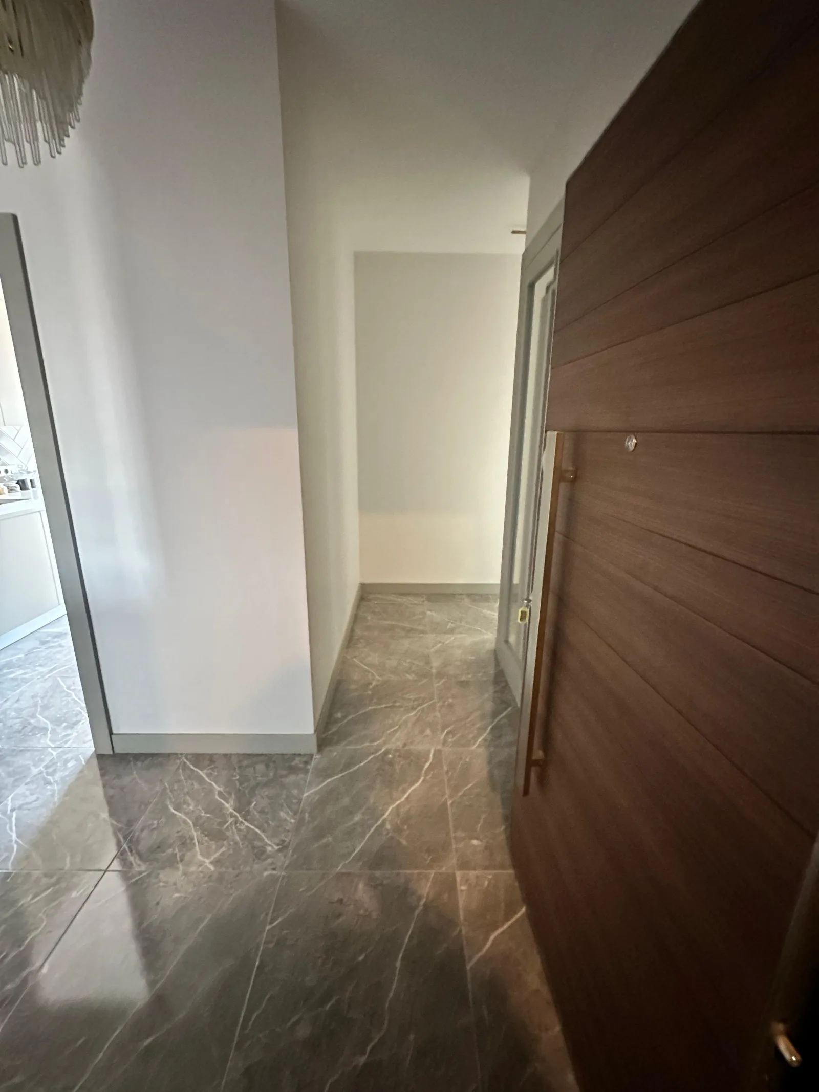 Bakirci Topkapi Sample apartment — kitchen and living long view