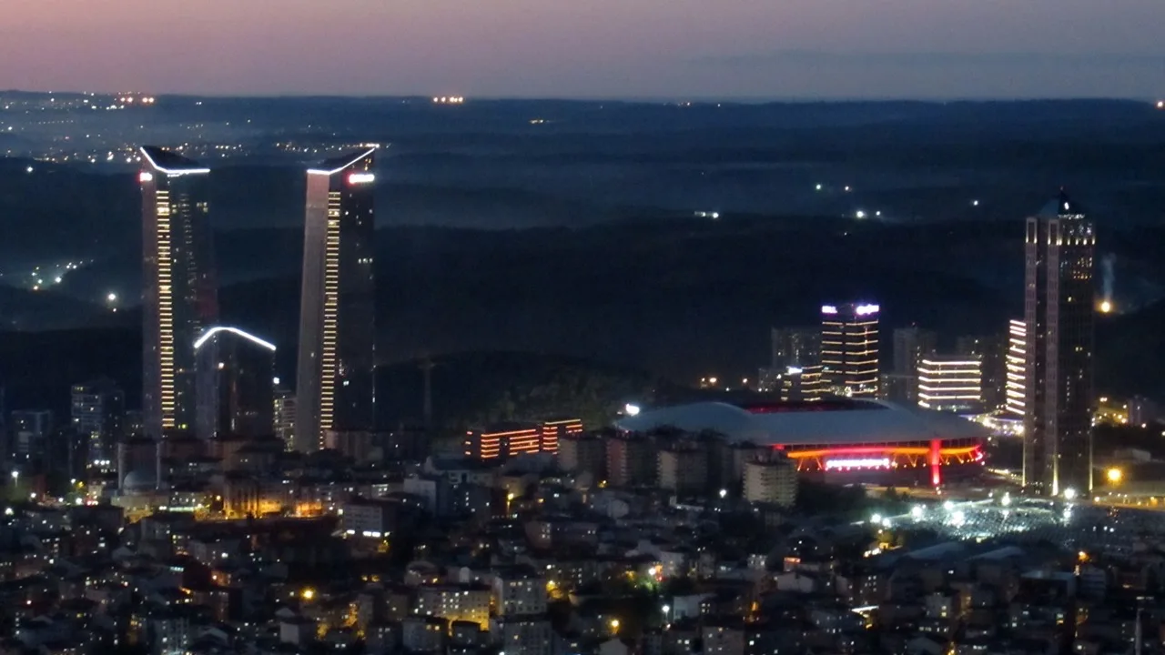 Skyland Istanbul illuminated tower silhouette at night