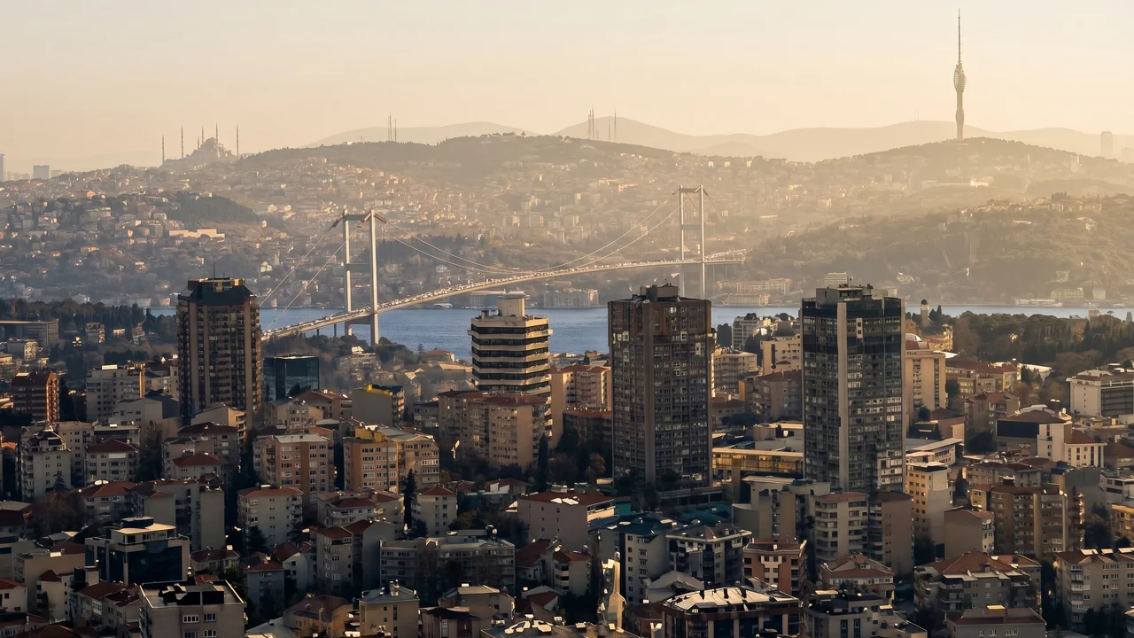Torun Center high-floor view toward the Bosphorus bridge and Asian side hills